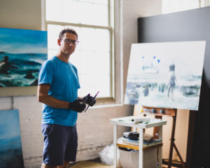 Artist Britt Snyder in his studio at Western Avenue